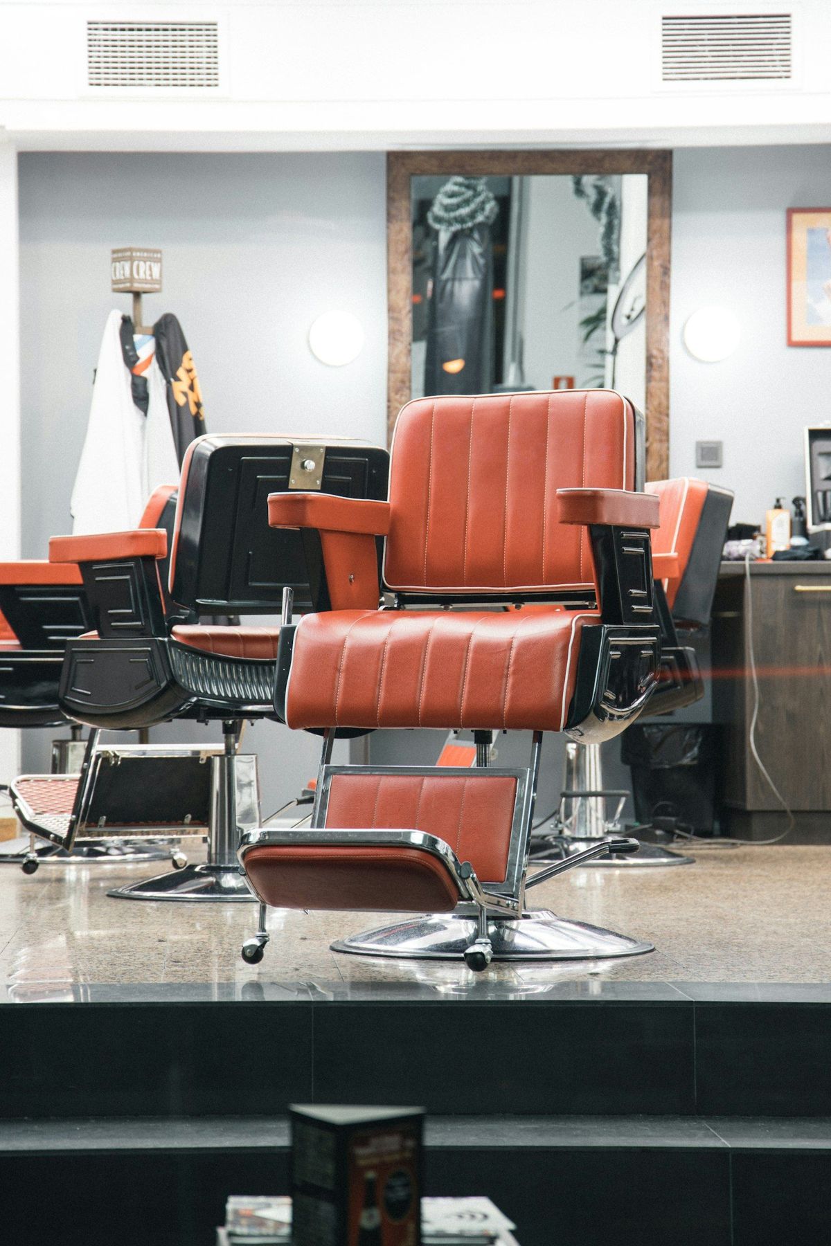 Leather barber chairs in an empty barbershop